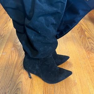 We worn / well loved knee high heeled boots